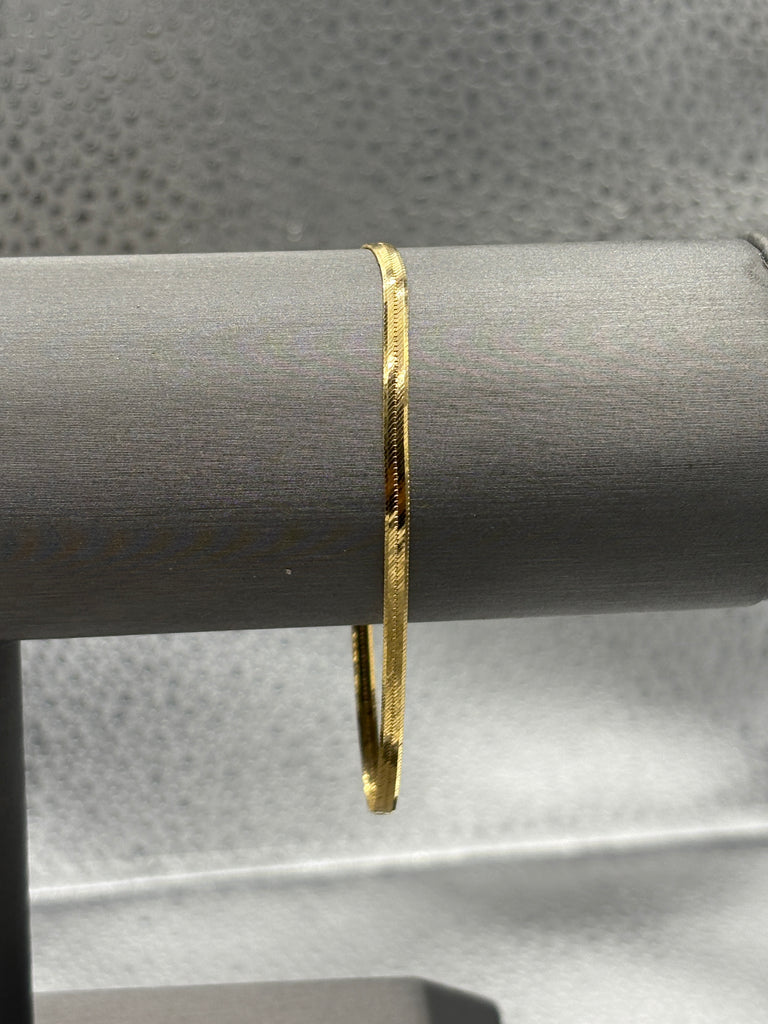 14 Karat Yellow Gold Ladies Beveled Herringbone Bracelet