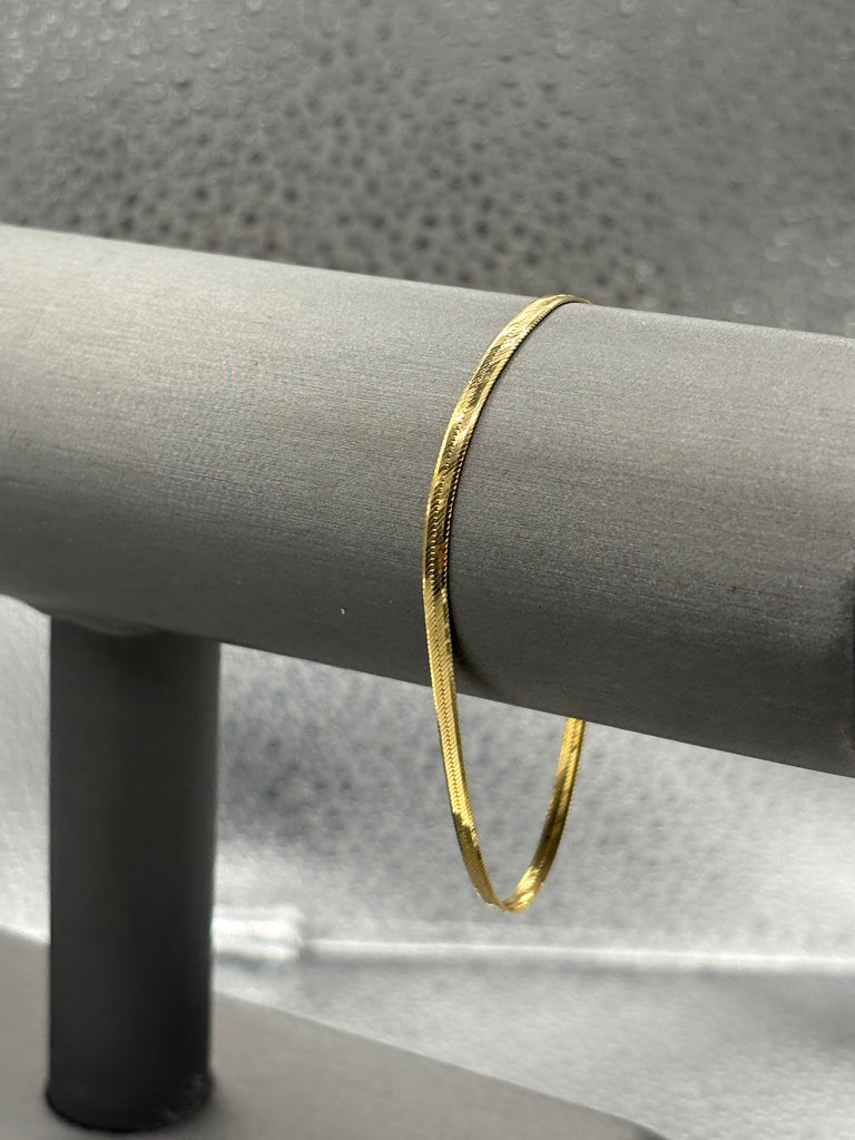 14 Karat Yellow Gold Ladies Beveled Herringbone Bracelet