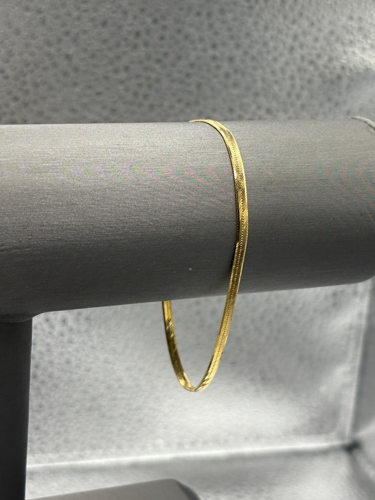14 Karat Yellow Gold Ladies Beveled Herringbone Bracelet