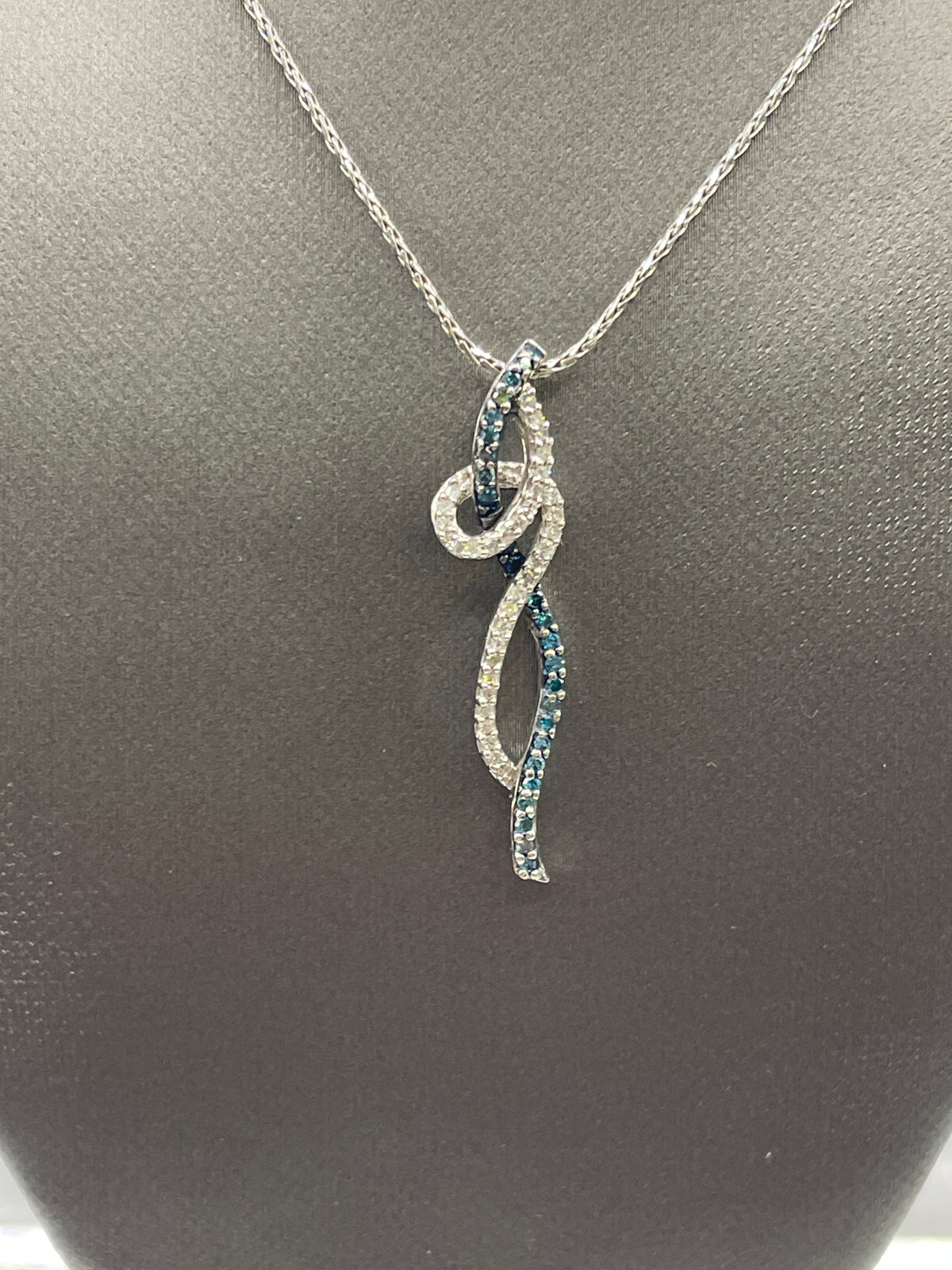 Ladies 10 Karat White Gold White and Blue Diamond Pendant