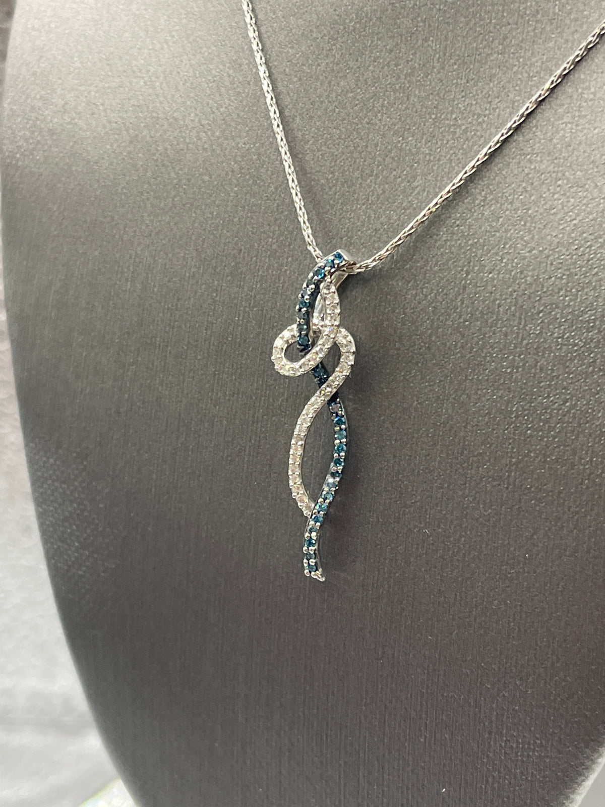 Ladies 10 Karat White Gold White and Blue Diamond Pendant