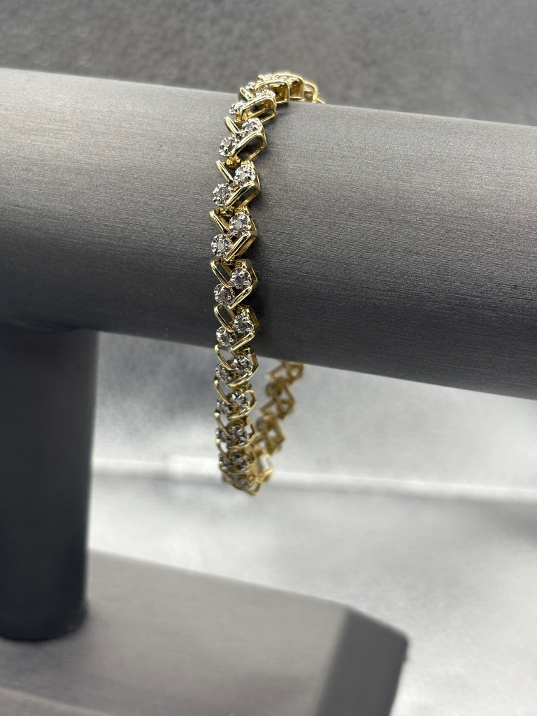 14 Karat Yellow Gold Ladies Diamond Zig Zag Bracelet