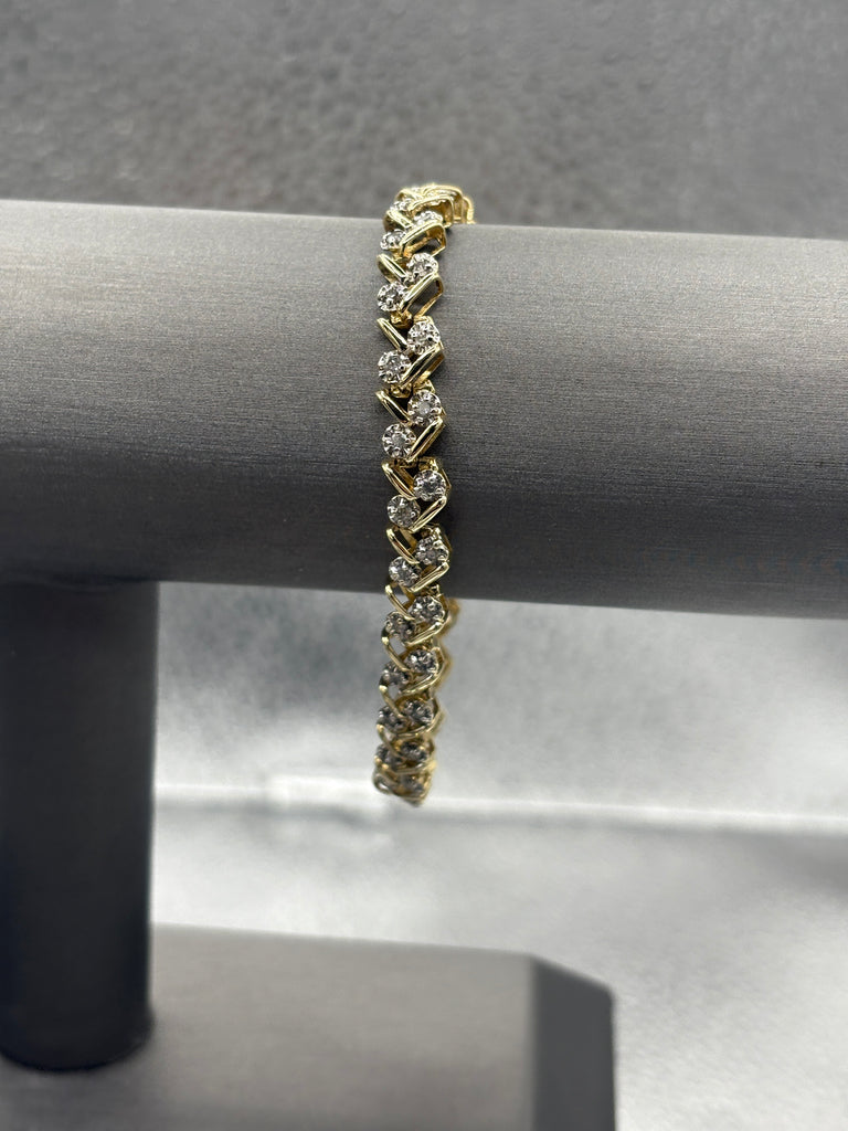 14 Karat Yellow Gold Ladies Diamond Zig Zag Bracelet