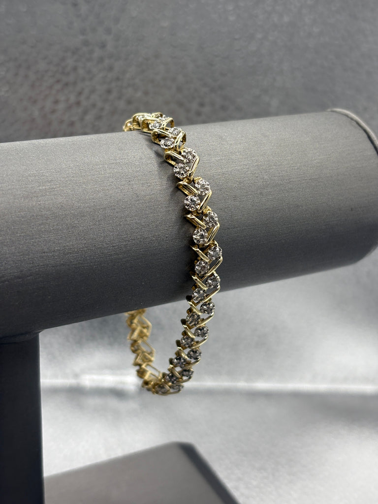 14 Karat Yellow Gold Ladies Diamond Zig Zag Bracelet