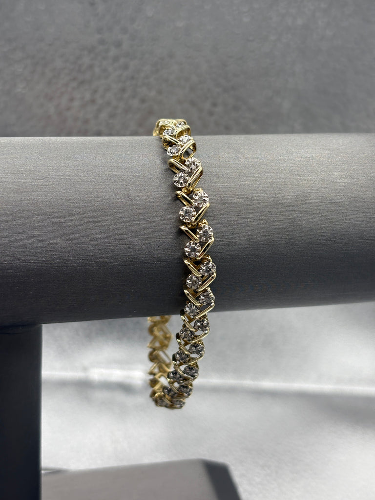 14 Karat Yellow Gold Ladies Diamond Zig Zag Bracelet