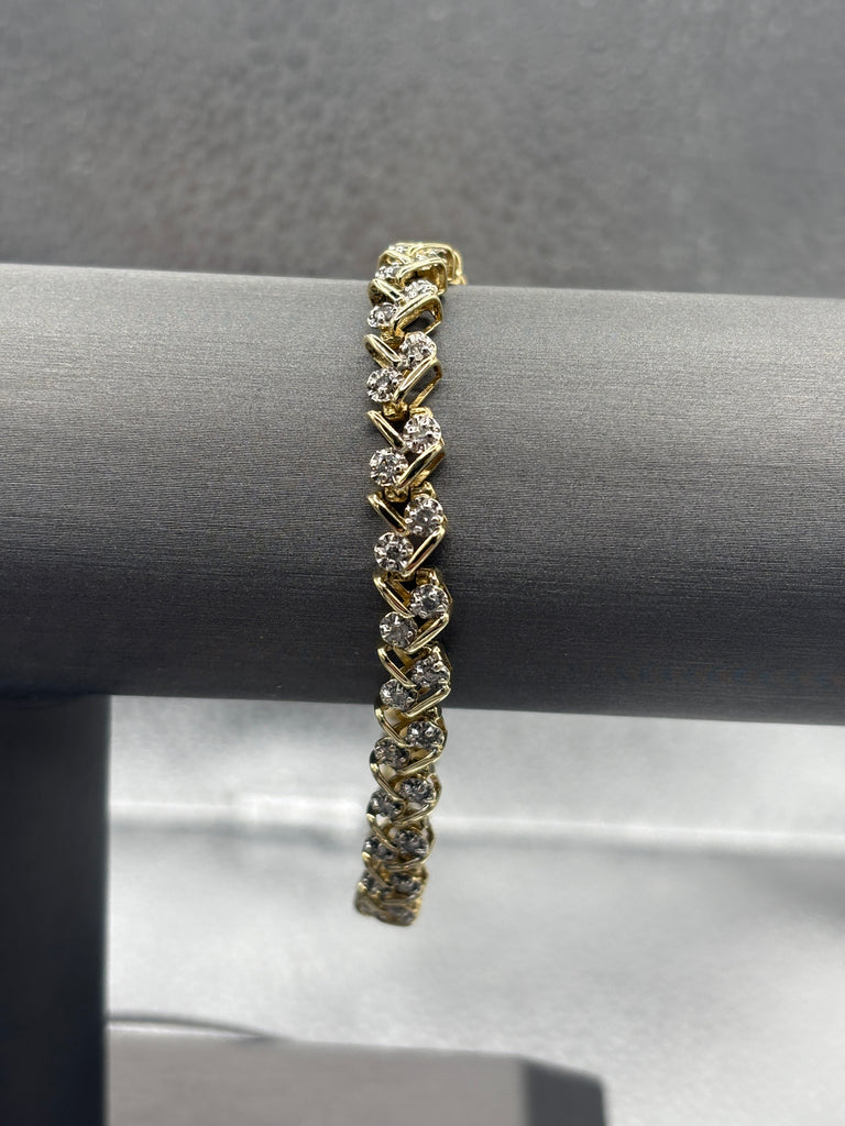 14 Karat Yellow Gold Ladies Diamond Zig Zag Bracelet