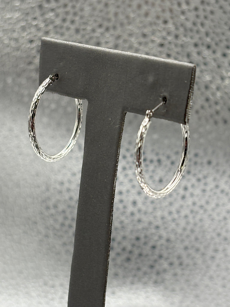 14 Karat Ladies White Gold Twisted Hoop Earrings