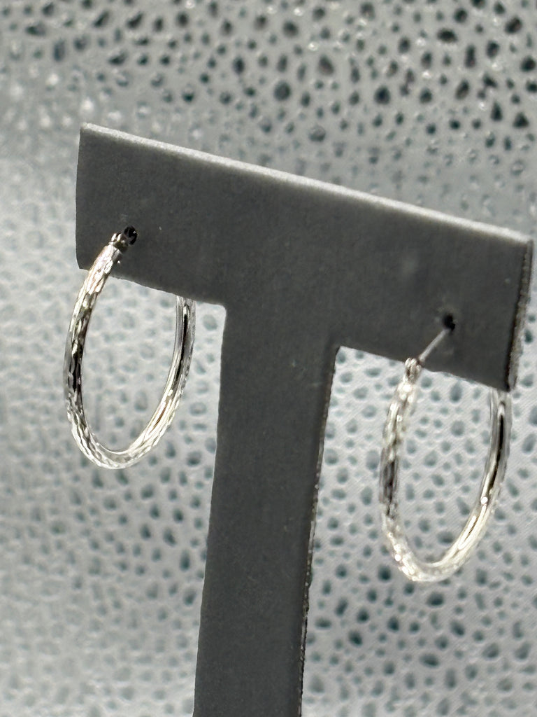 14 Karat Ladies White Gold Twisted Hoop Earrings