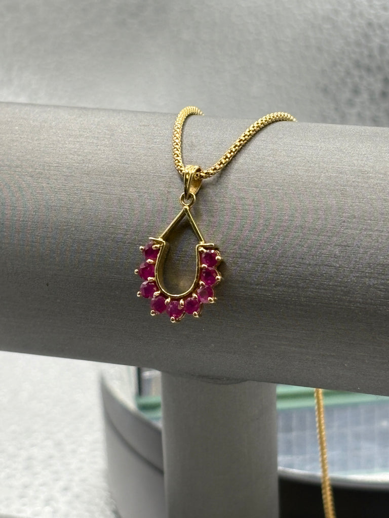 14 Karat Yellow Gold Ruby Horseshoe Pendant Popcorn Necklace