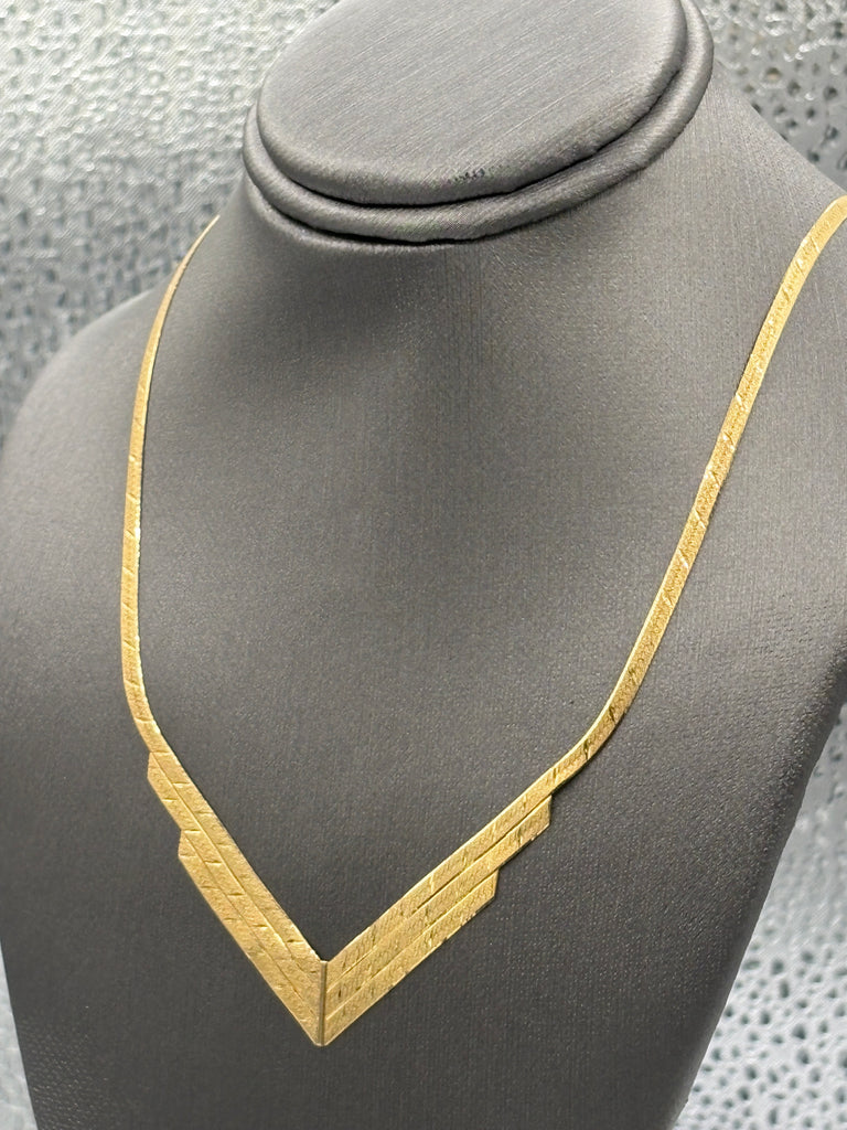 14 Karat Yellow Gold Ladies Di-Cut Triple V Herringbone Necklace