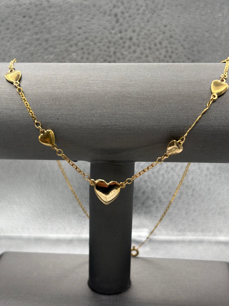 14 Karat Yellow Gold Ladies Graduated Multi-Heart Necklace