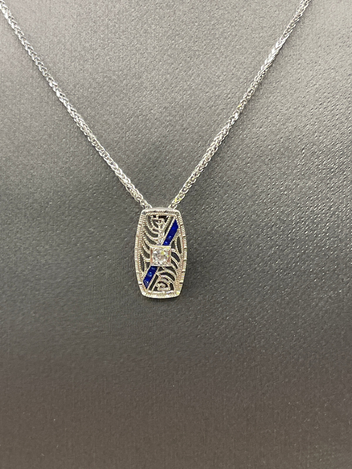 View one of Ladies Antique 14 Karat White Gold Sapphire Enamel & Diamond Pendant