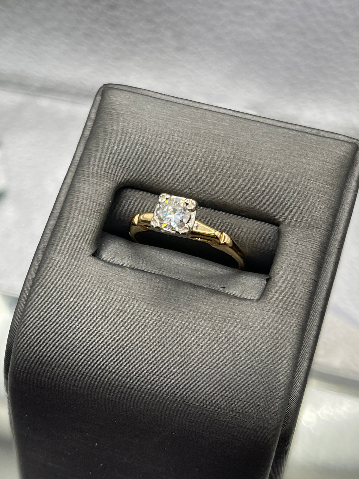 A ladies Vintage 14 Karat Yellow Gold Diamond Engagement Ring