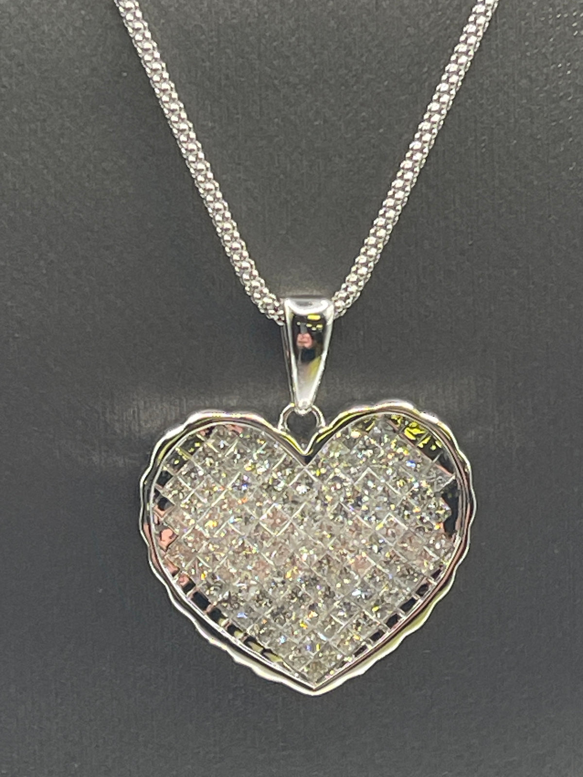 Ladies 14 karat White Gold Princess Cut Diamond Heart Pendant