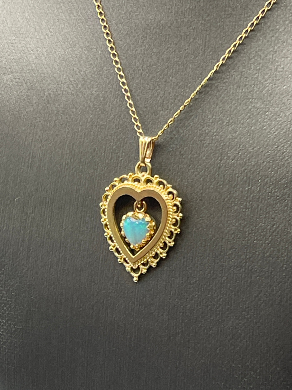 View one of Ladies 14 Karat Solid Yellow Gold Opal Heart Pendant