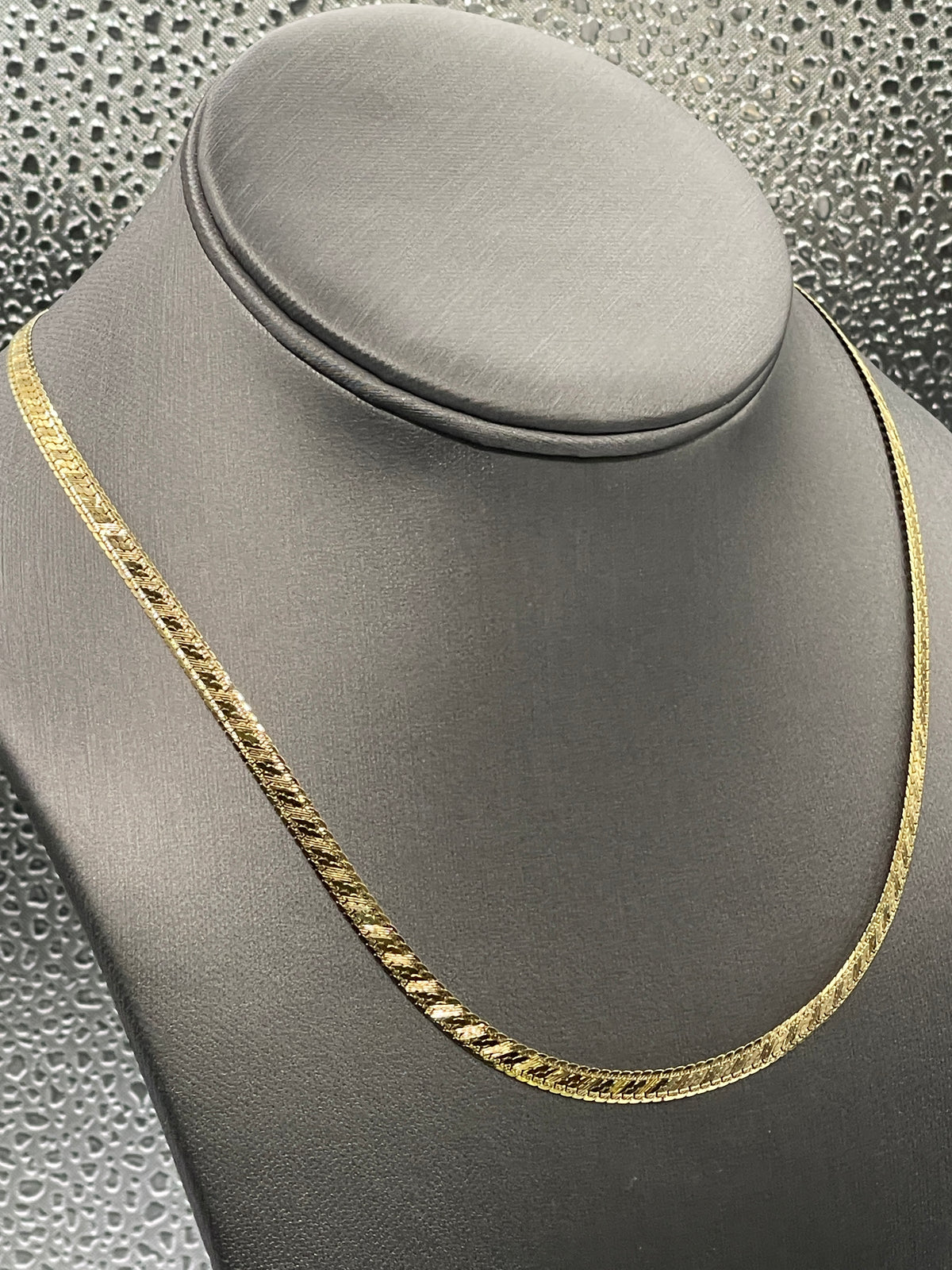 View two of Ladies/Men's 14 Karat Yellow Gold Di-Cut Herringbone Chain