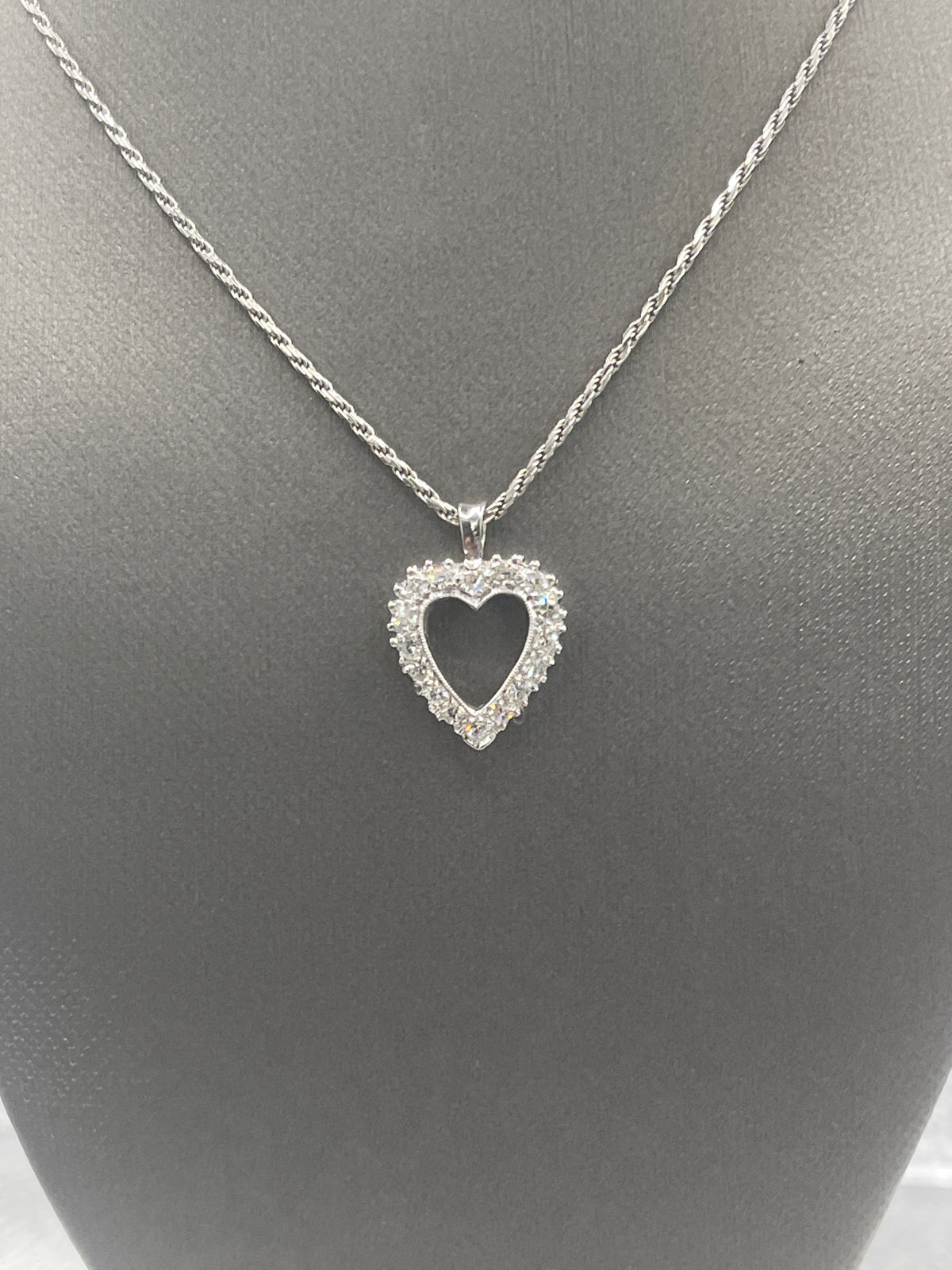 View one of Ladies 14 Karat Solid White Gold Diamond Heart Pendant
