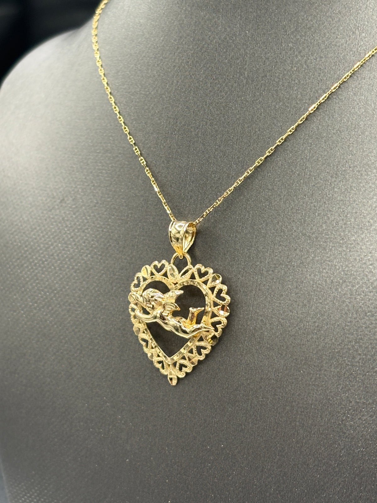 14kt Yellow gold flying cupid charm