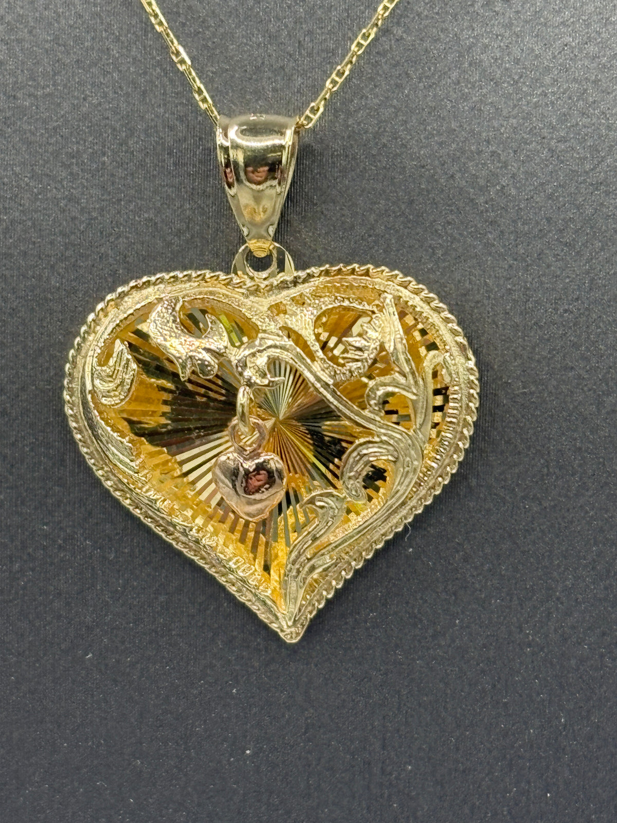 14kt Yellow Gold Heart with custom framing around a dangling heart set in the middle
