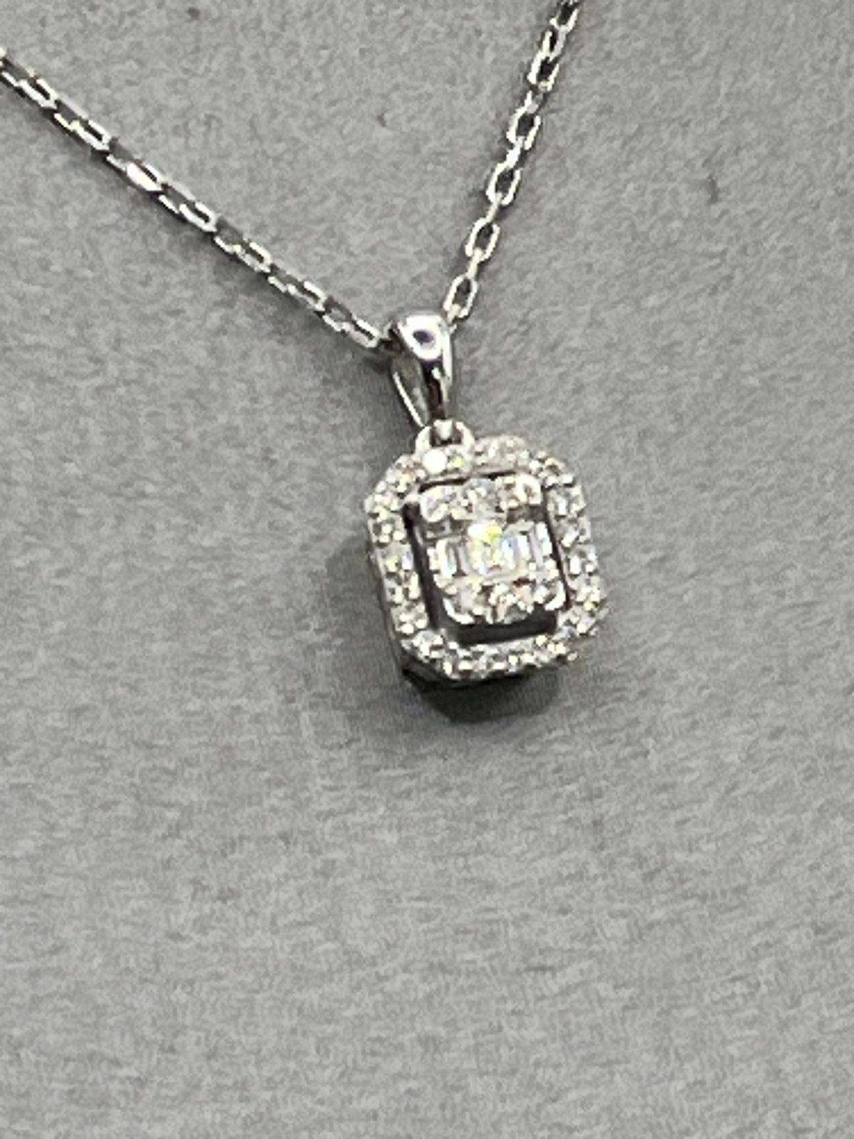 Ladies 18 Karat White Gold Emerald & Round Diamond Halo Pendant & Chain