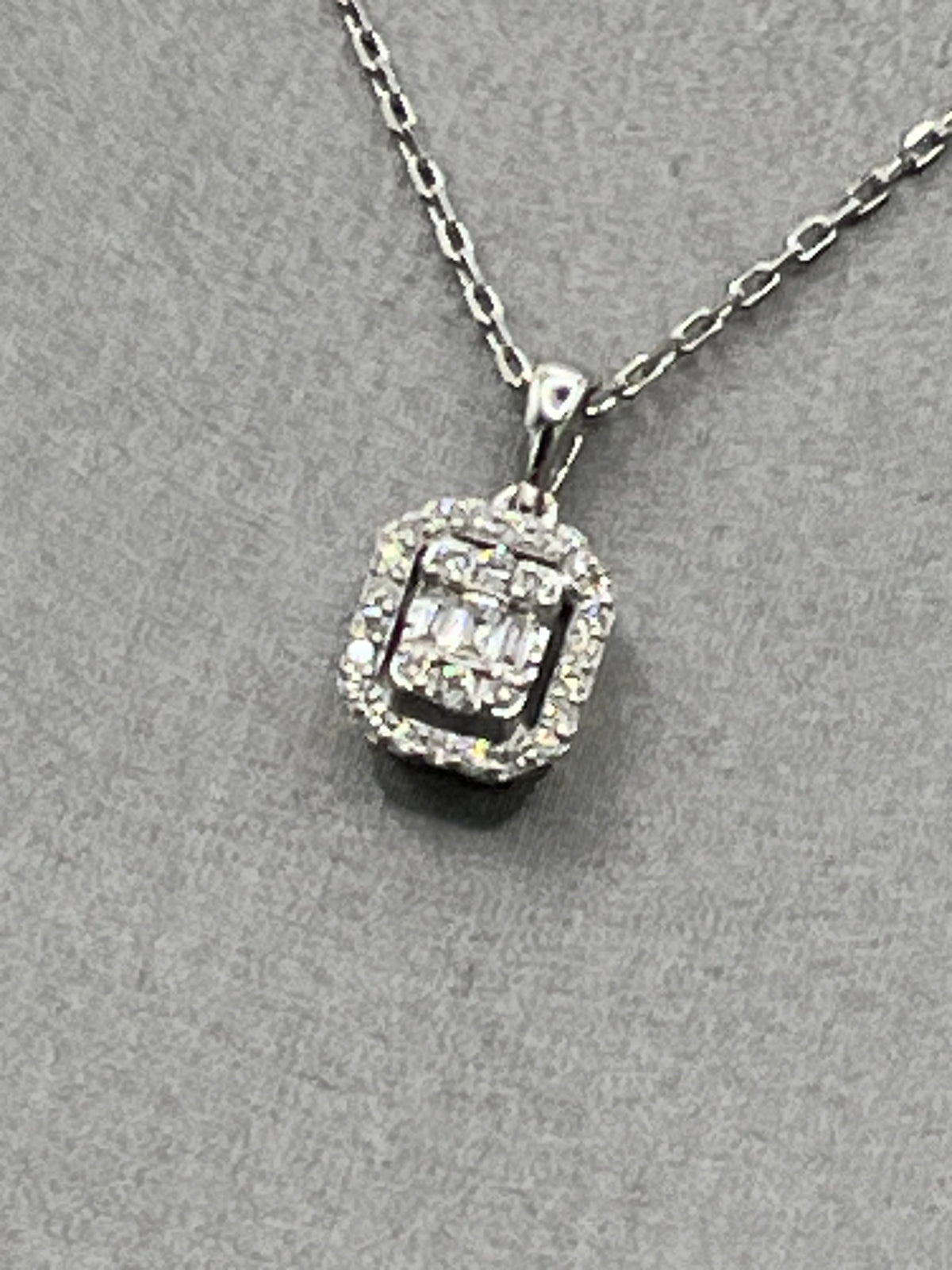 Ladies 18 Karat White Gold Emerald & Round Diamond Halo Pendant & Chain