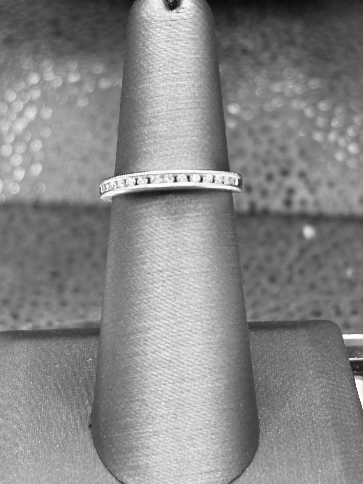 14kt solid white gold Ladies diamond anniversary band channel set with 14 fine white round diamonds