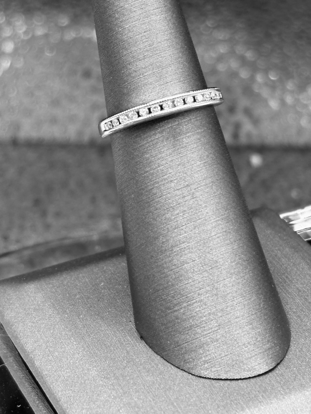 14kt solid white gold Ladies diamond anniversary band channel set with 14 fine white round diamonds