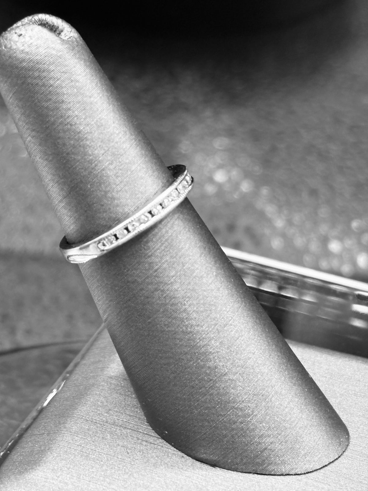14kt solid white gold Ladies diamond anniversary band channel set with 14 fine white round diamonds