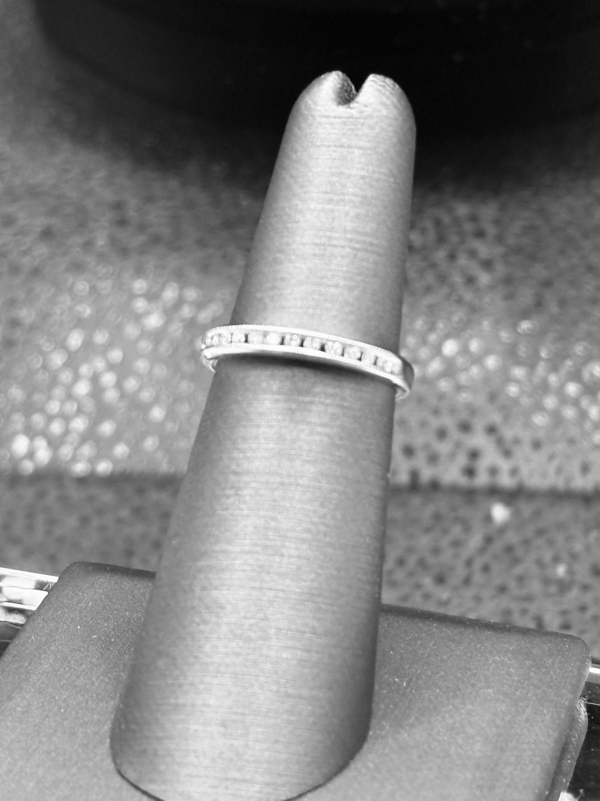 14kt solid white gold Ladies diamond anniversary band channel set with 14 fine white round diamonds