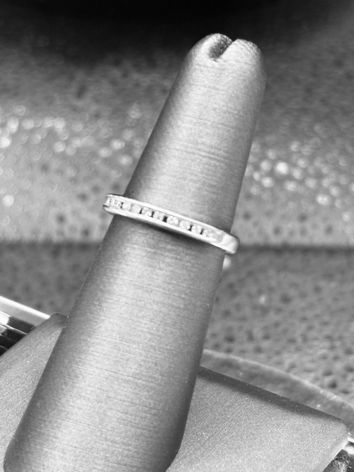 14kt solid white gold Ladies diamond anniversary band channel set with 14 fine white round diamonds