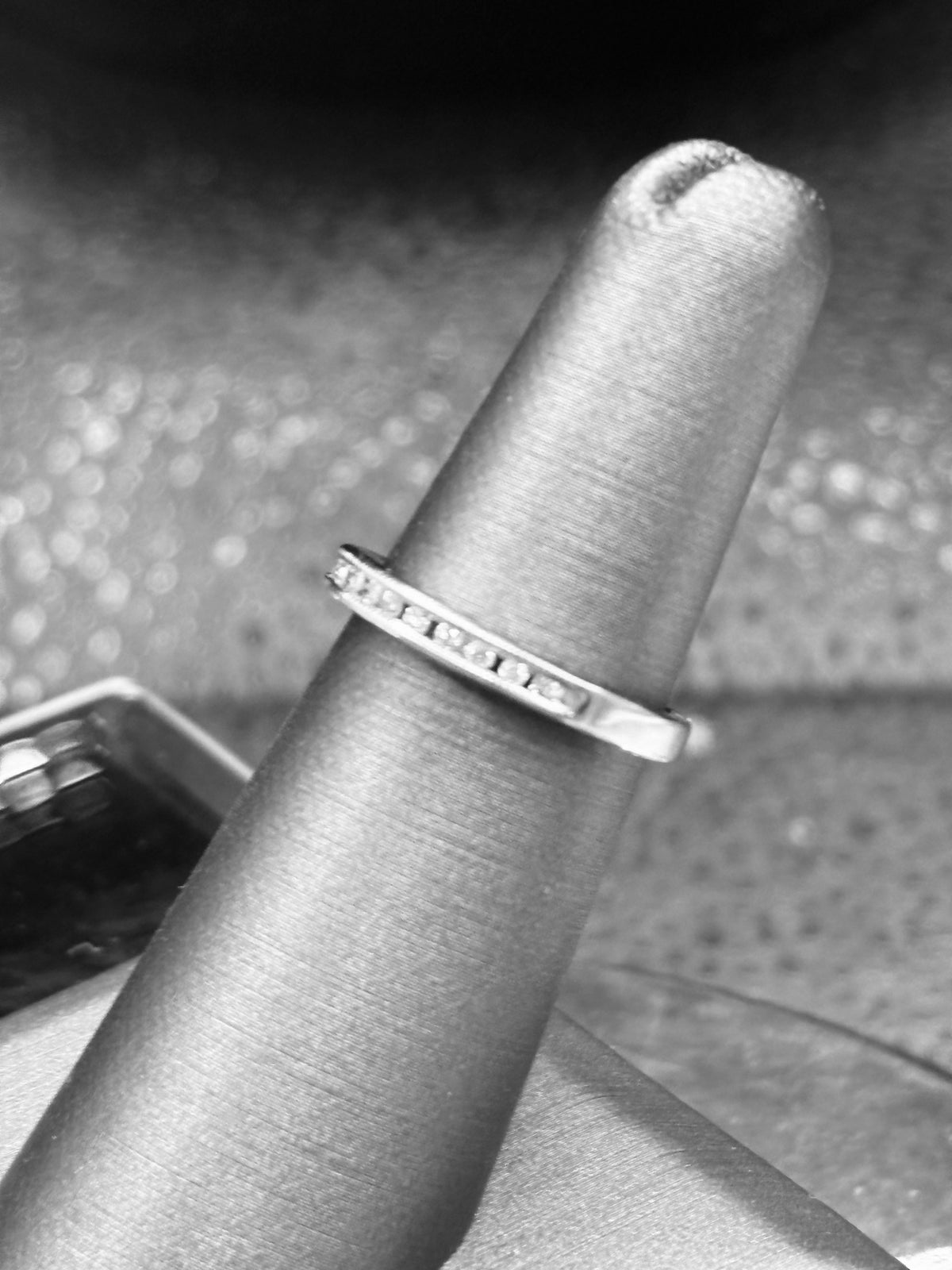 14kt solid white gold Ladies diamond anniversary band channel set with 14 fine white round diamonds
