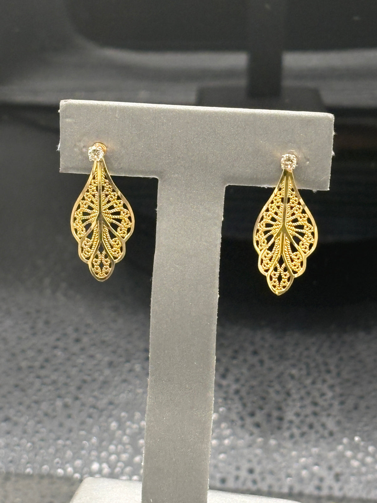 14kt solid yellow gold diamond stud earrings with gold filigree jackets