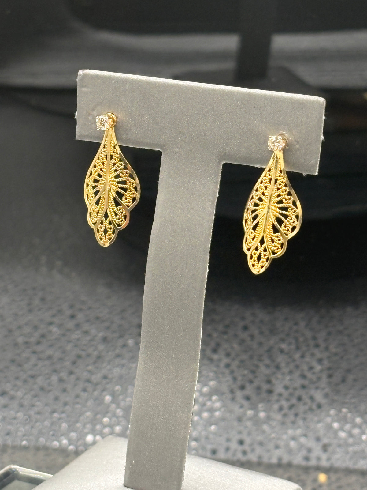 14kt solid yellow gold diamond stud earrings with gold filigree jackets