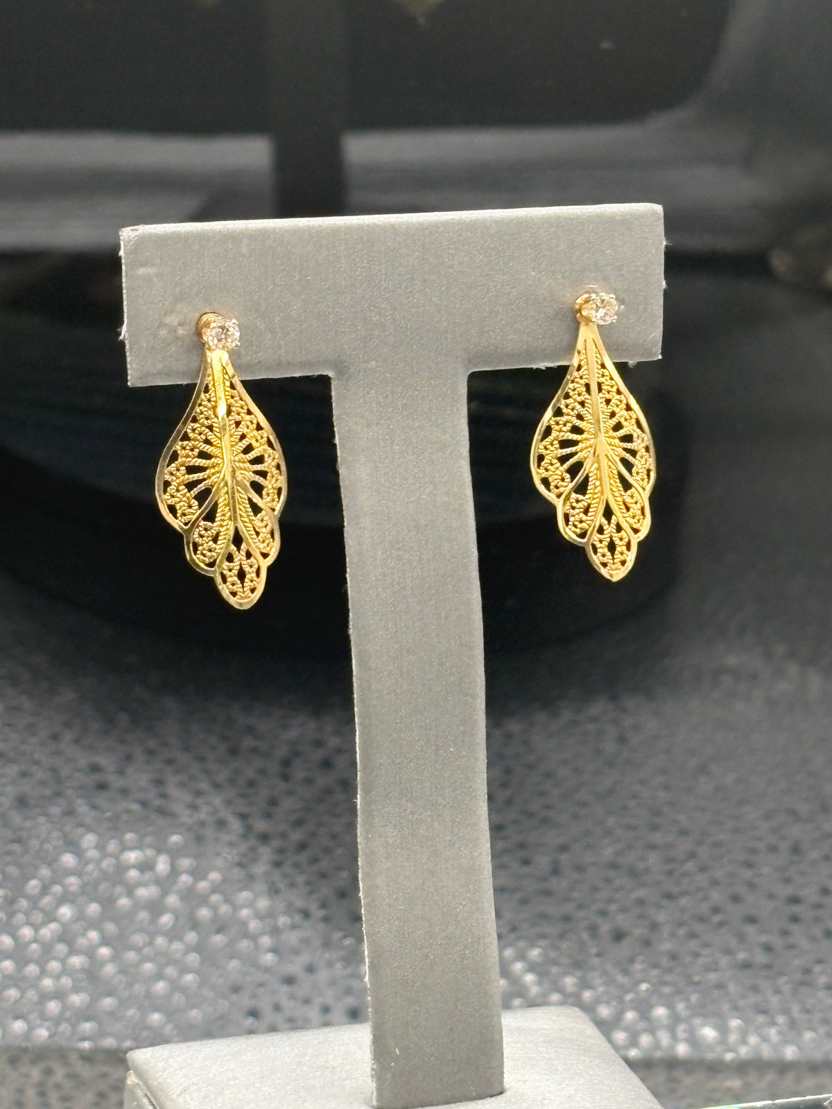 14kt solid yellow gold diamond stud earrings with gold filigree jackets