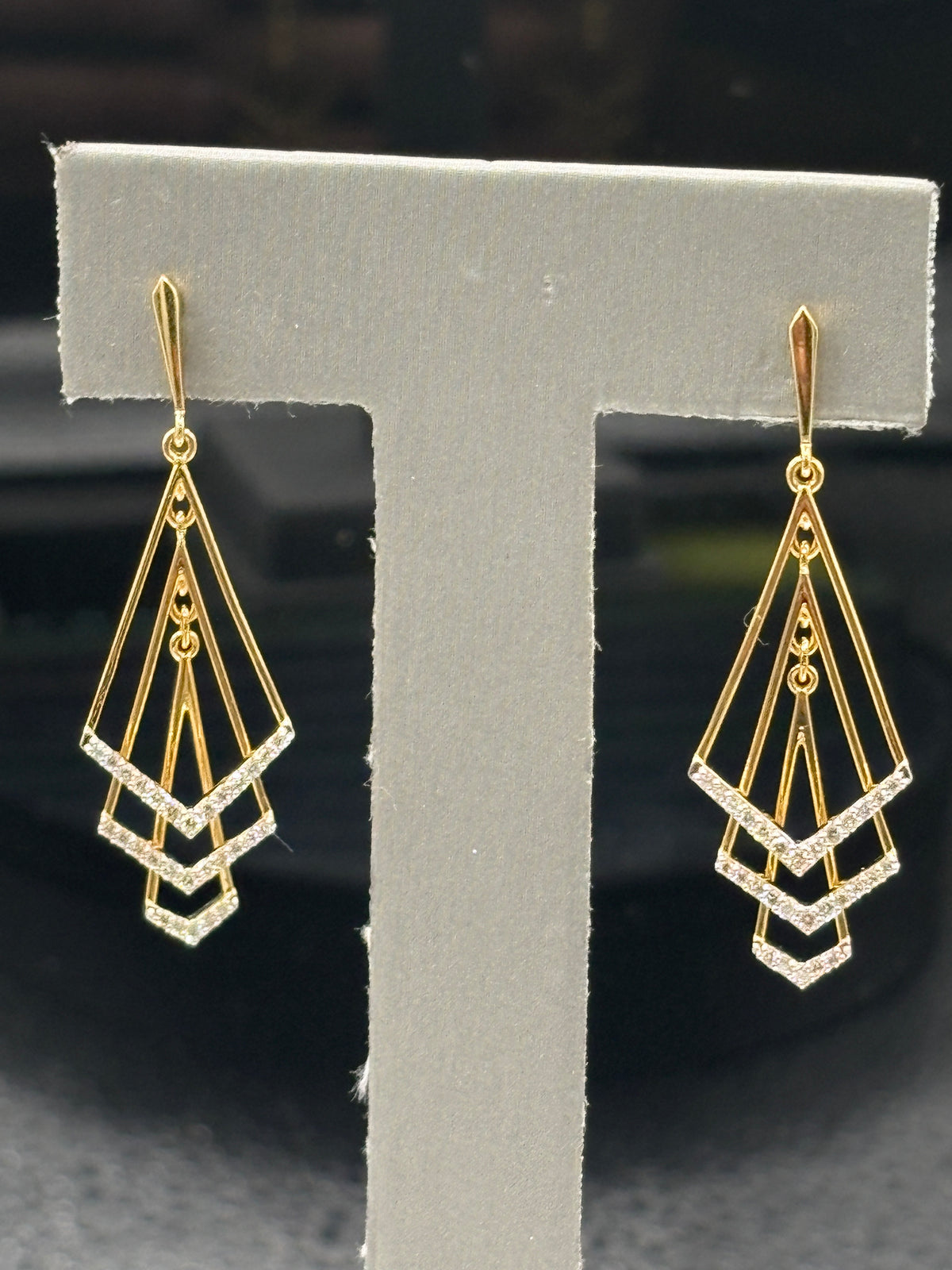 18kt Yellow gold ladies diamond dangling earrings with a geometric, kinetic shape with diamond accents