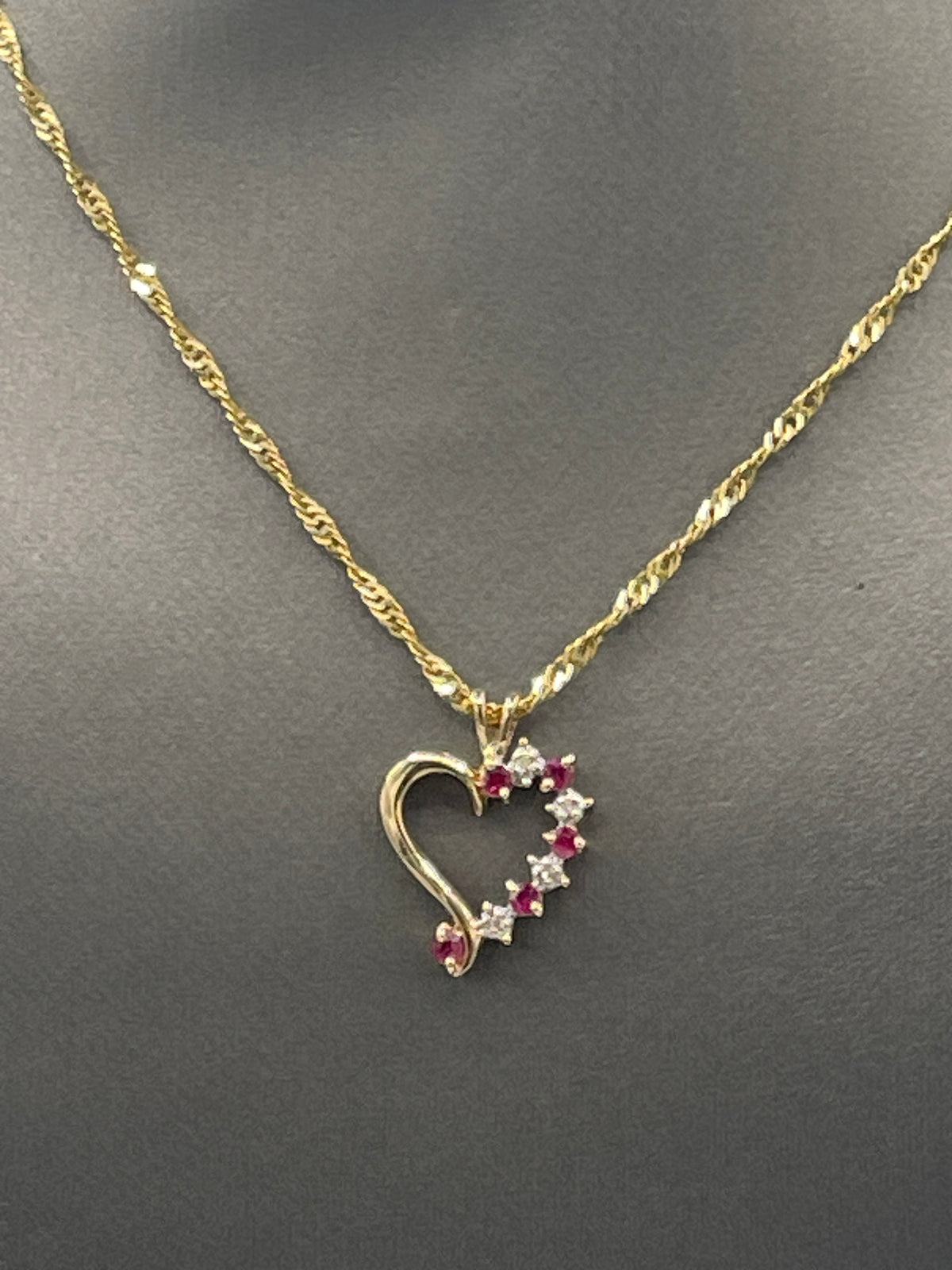 Ladies 14 Karat Yellow Gold Ruby & Diamond Heart Pendant