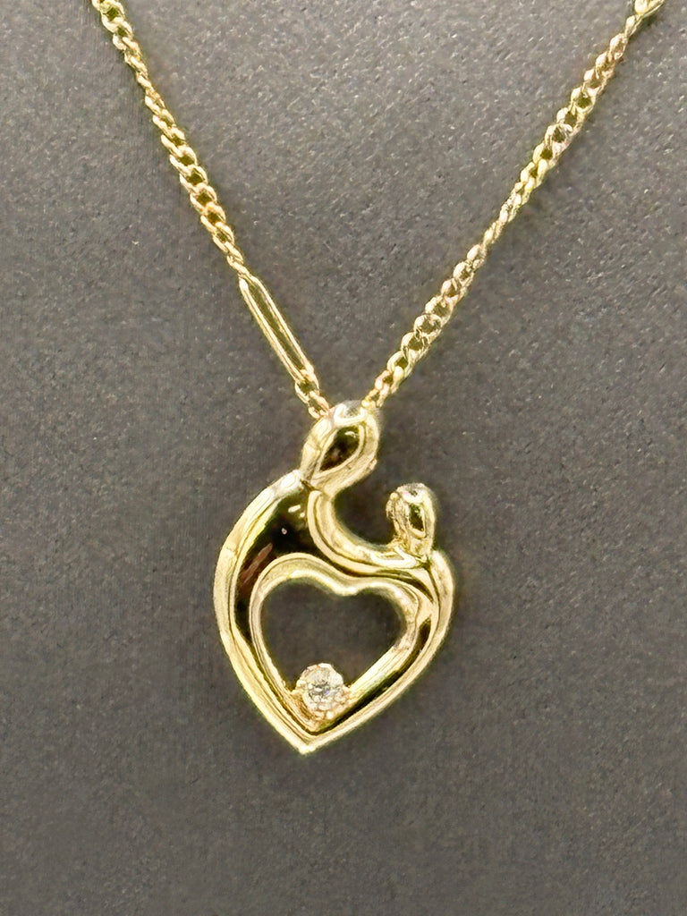 View one of Ladies 14 Karat Yellow Gold Mother & Baby Charm & Chain