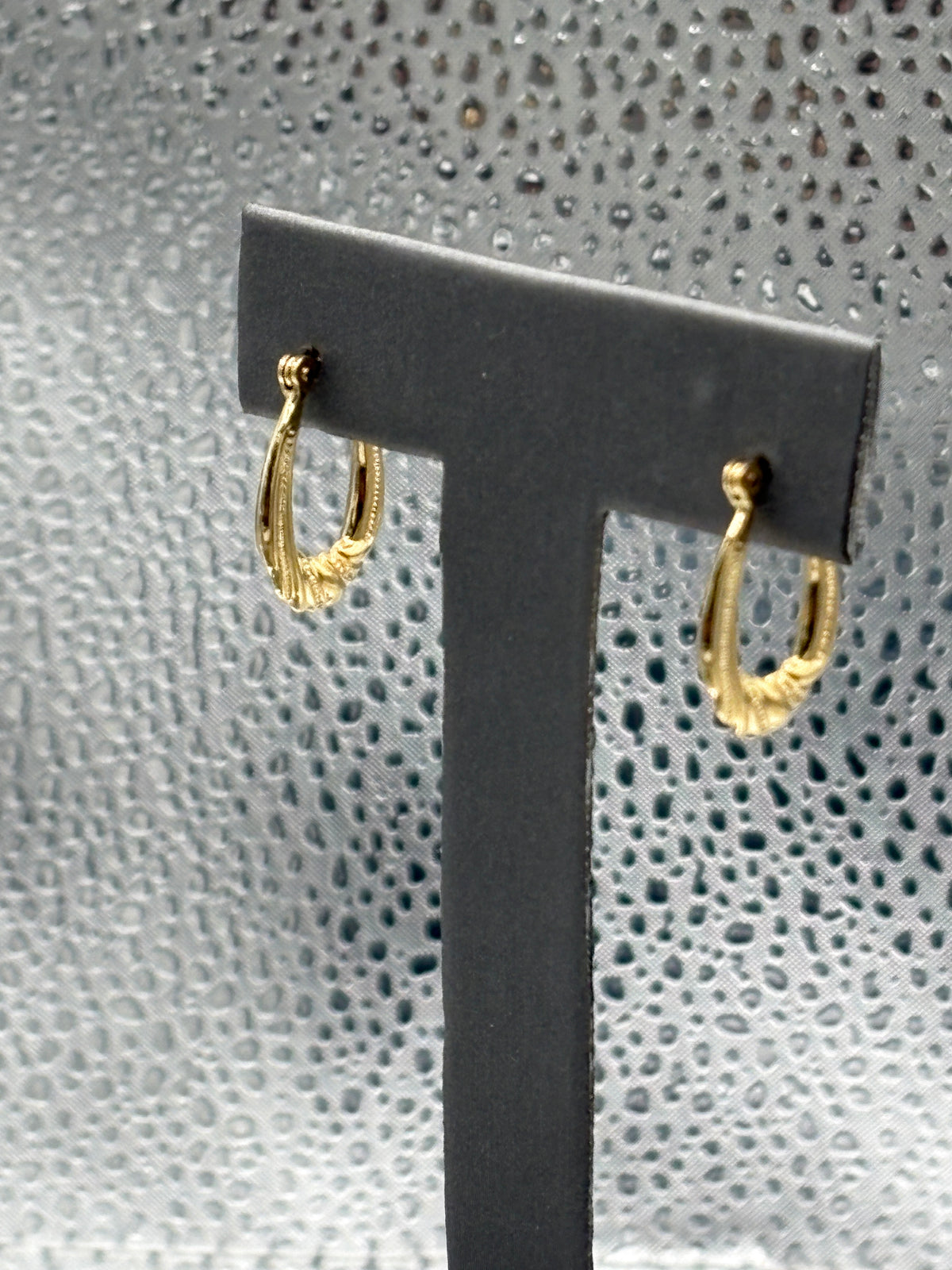 Ladies 14 Karat Yellow Gold Ribbon Hoop Earrings