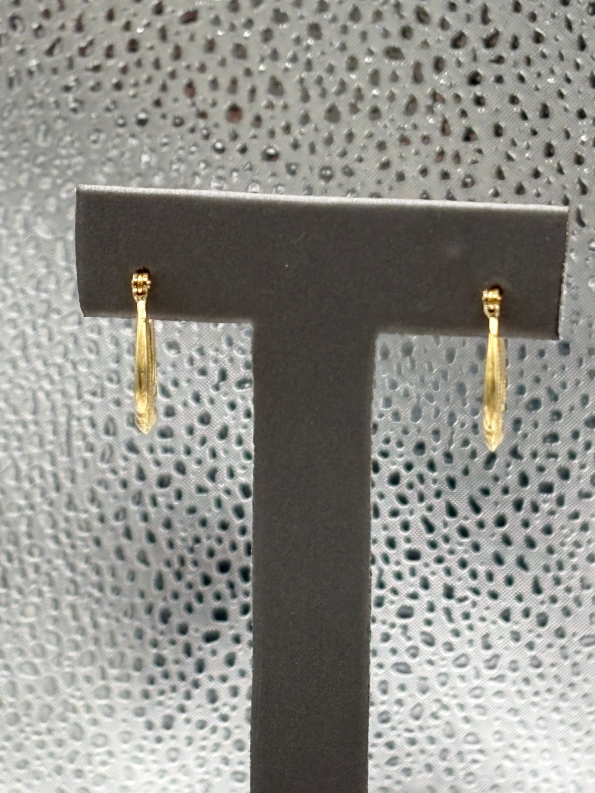Ladies 14 Karat Yellow Gold Ribbon Hoop Earrings