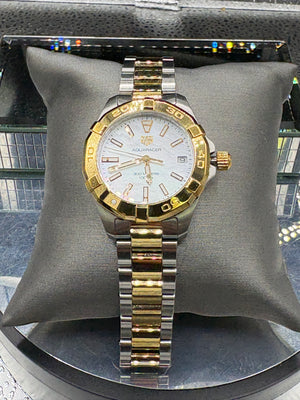 Vintage TAG Heuer Aquaracer Quartz ladies watch. 32mm diameter, steel/yellow Gold. Sports and diver watch with a double security clasp and unidirectional bezel