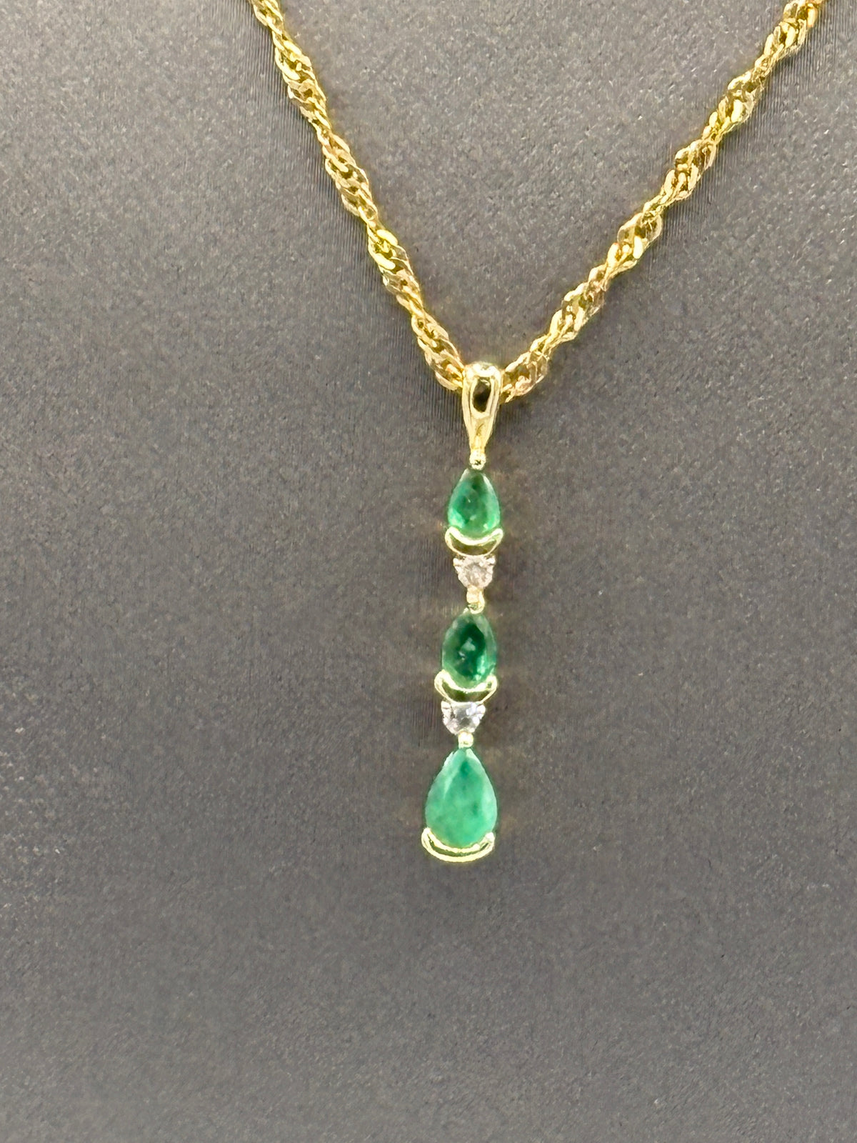 View one of Ladies 14 Karat Yellow Gold Teardrop Emerald & Diamond Pendant