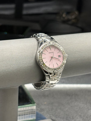 Vintage Seiko womens stainless steel calendar quartz watch with pink  dial