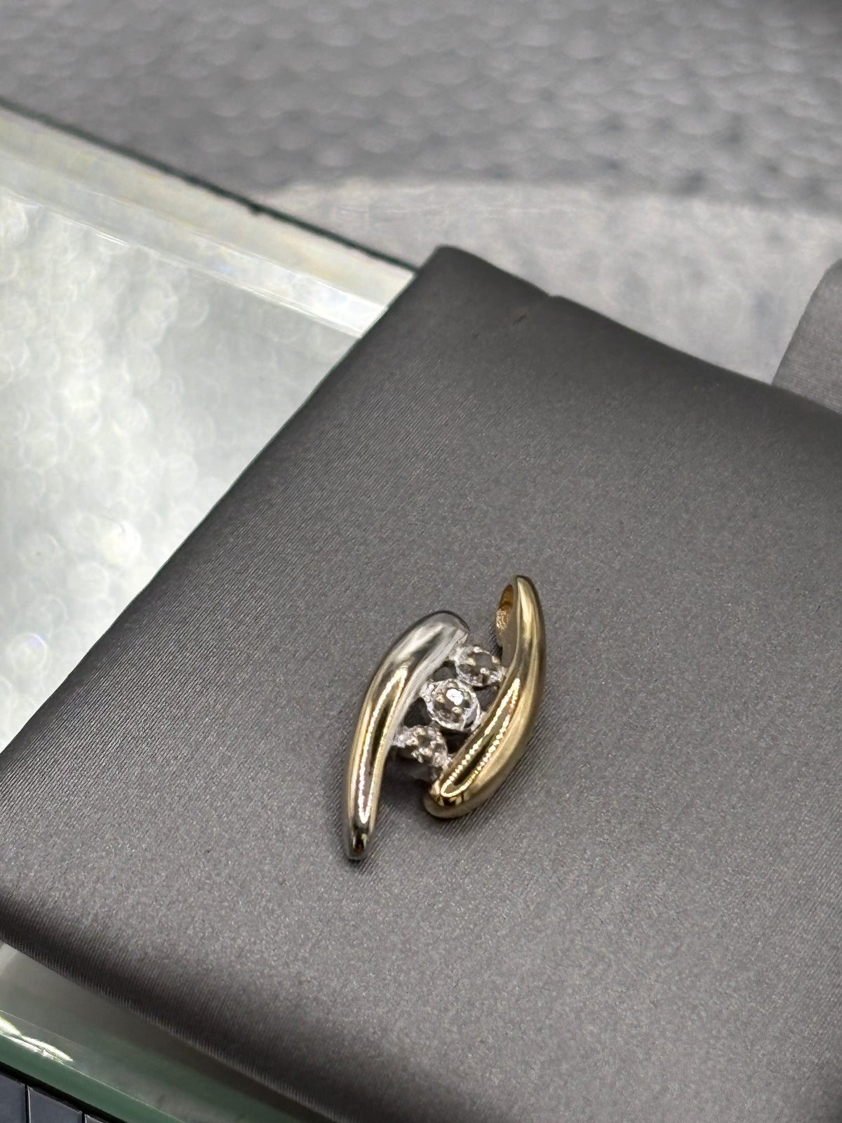 Ladies beautiful 10 Karat Two Tone Gold Diamond Bypass Pendant