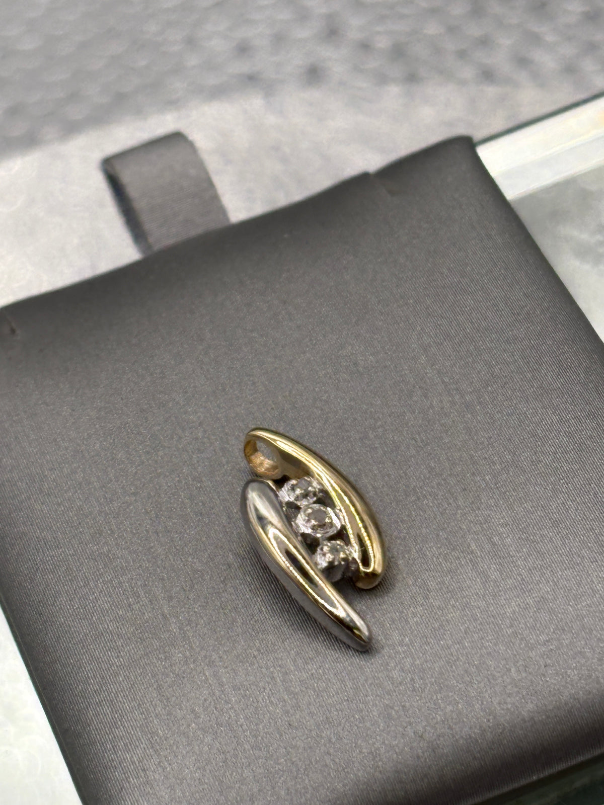 Ladies beautiful 10 Karat Two Tone Gold Diamond Bypass Pendant