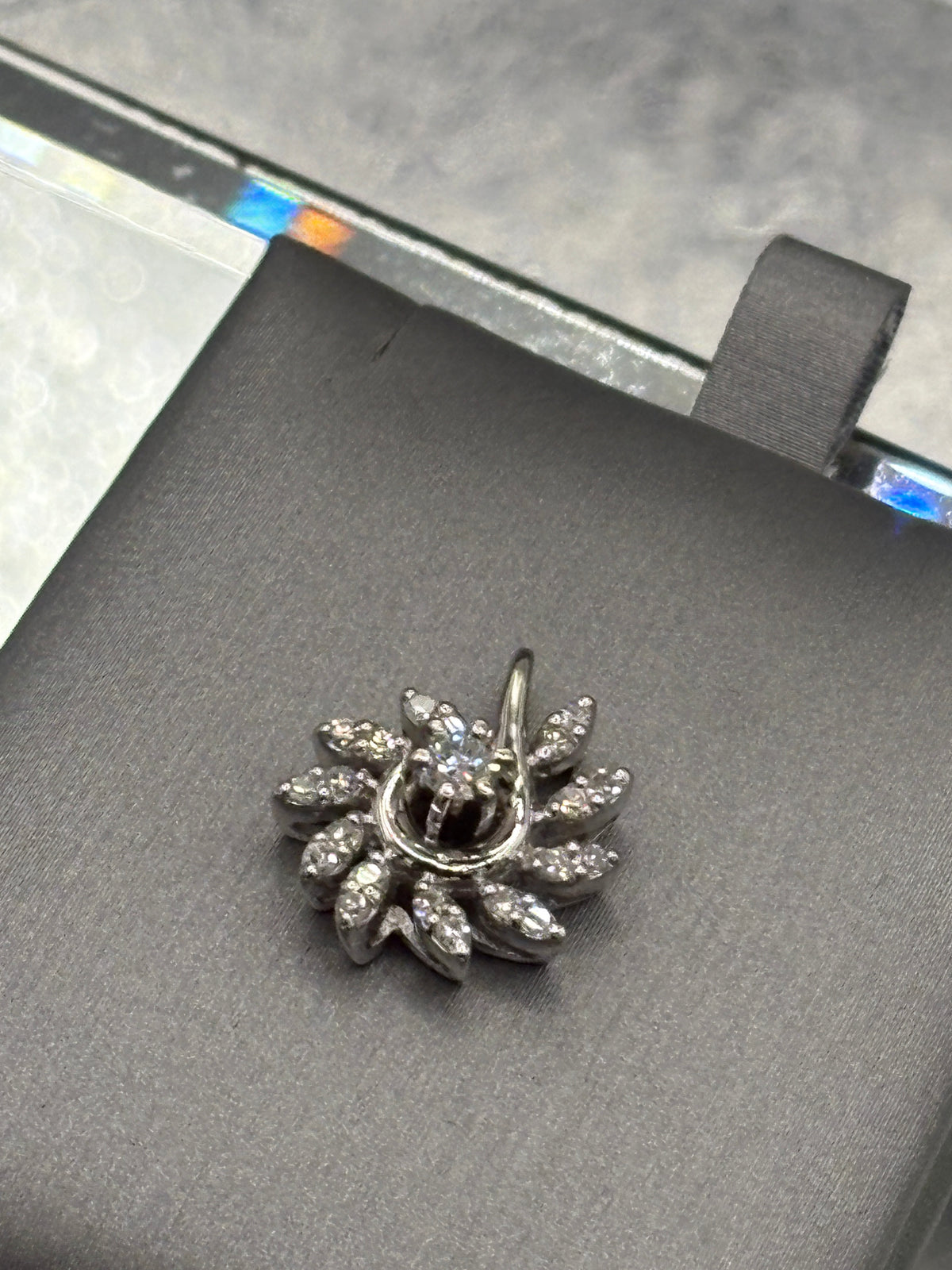 Ladies 14 Karat White Gold Diamond Swirl Floral Pendant