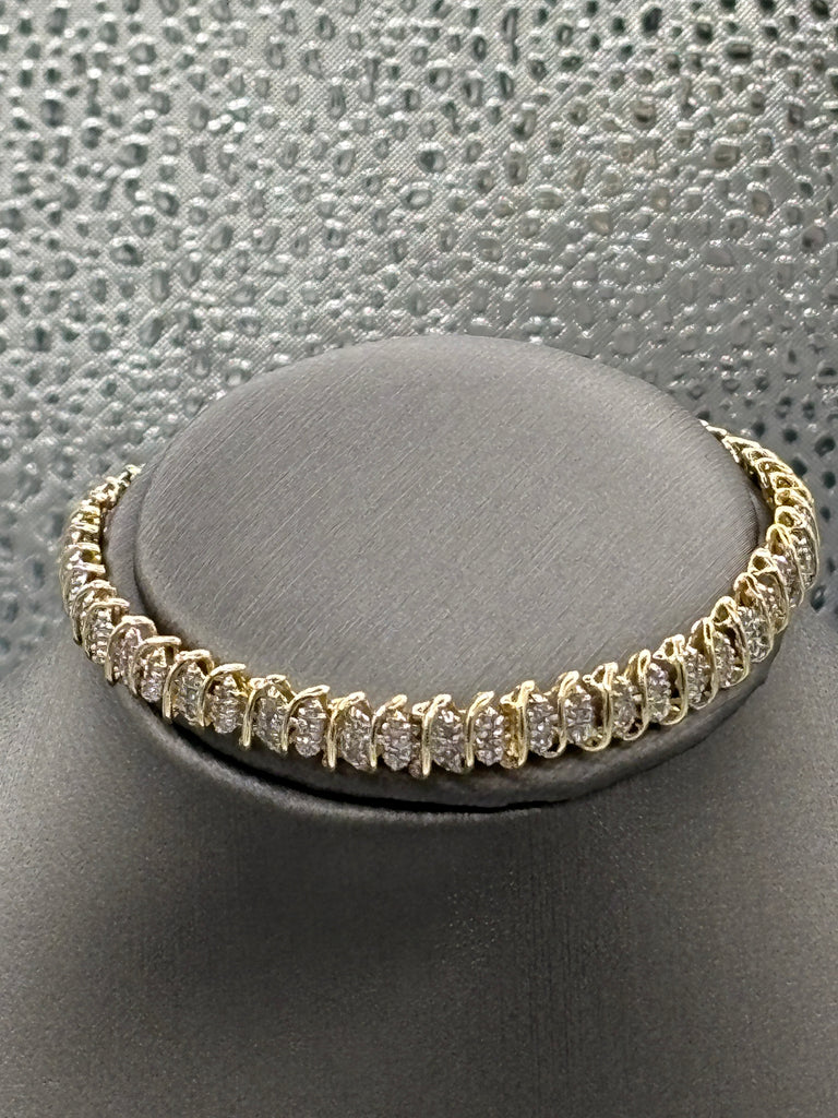 View one of Ladies 10 Karat Yellow Gold Diamond Tennis Bracelet