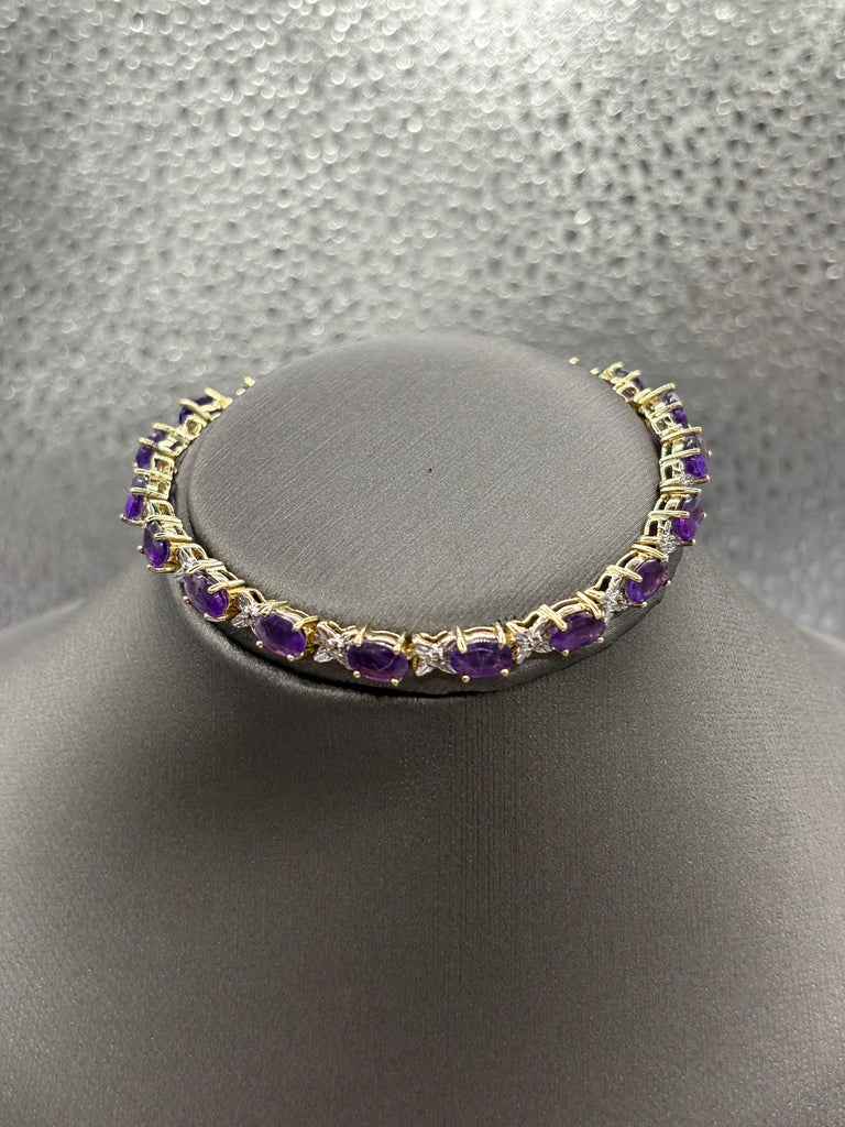 View one of Ladies 10 Karat Yellow Gold Amethyst & Diamond XO Bracelet