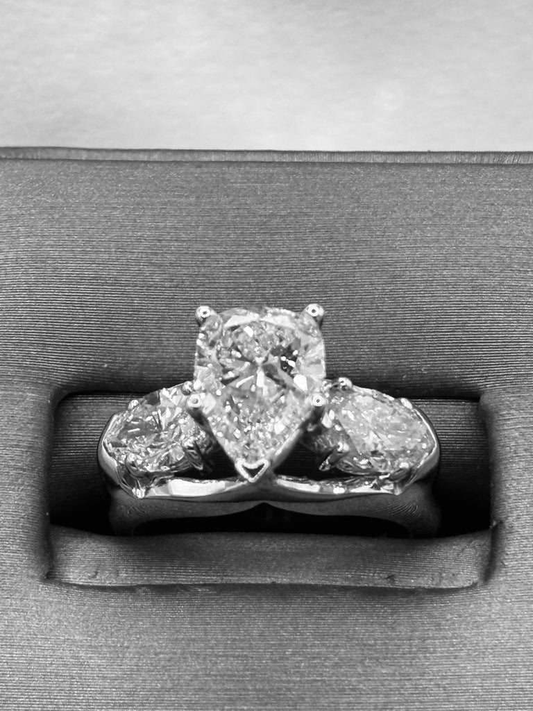 View one of Ladies 14 Karat White Gold Pear Shape Diamond Engagement Ring