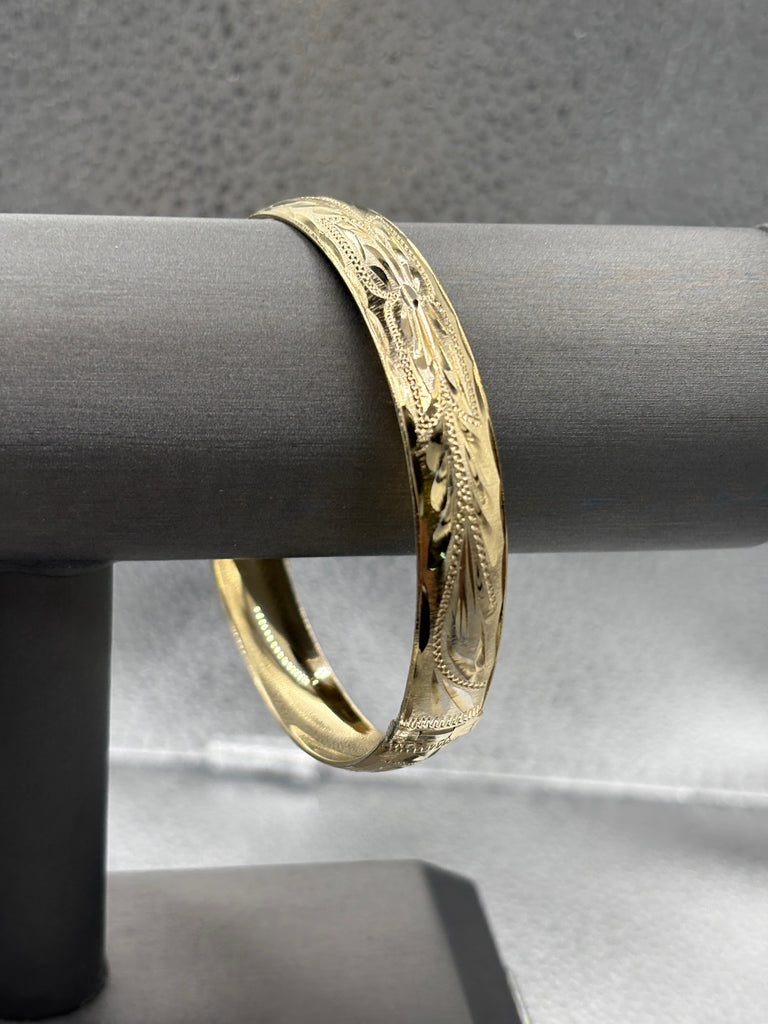 View one of Ladies 14 Karat Yellow Gold Fancy Oversized Bangle Bracelet