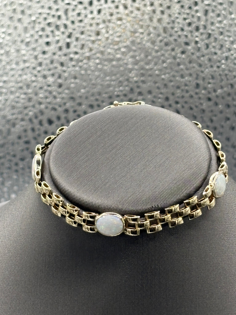 View one of Ladies Vintage 14 Karat Yellow Gold Opal Panther Link Bracelet